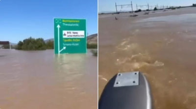Με σκάφος στην Εθνική Οδό - Το τερματίζει και μας δείχνει το μέγεθος της πλημμύρας (Βίντεο)