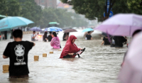 Εικόνες χάους στην Κίνα: Οι χειρότερες πλημμύρες της χιλιετίας